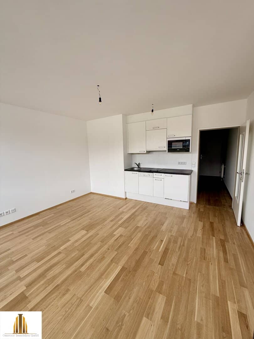 Helle Dachgeschoßwohnung mit Loggia in bester Lage
