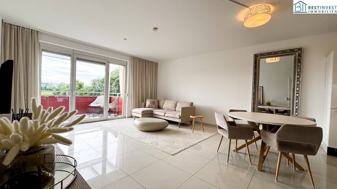 Helle Neubauwohnung mit Südterrasse und Grünblick