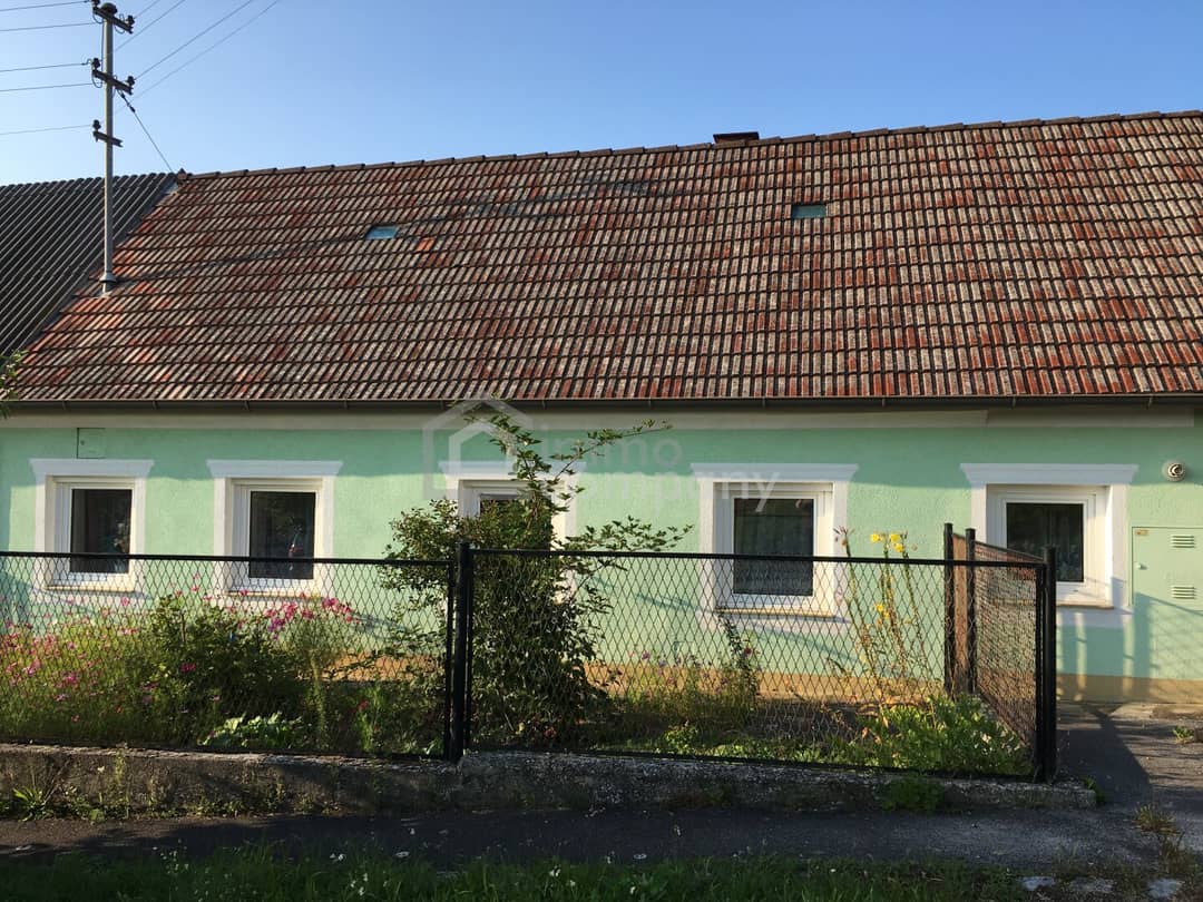 Country house with garden and distant view