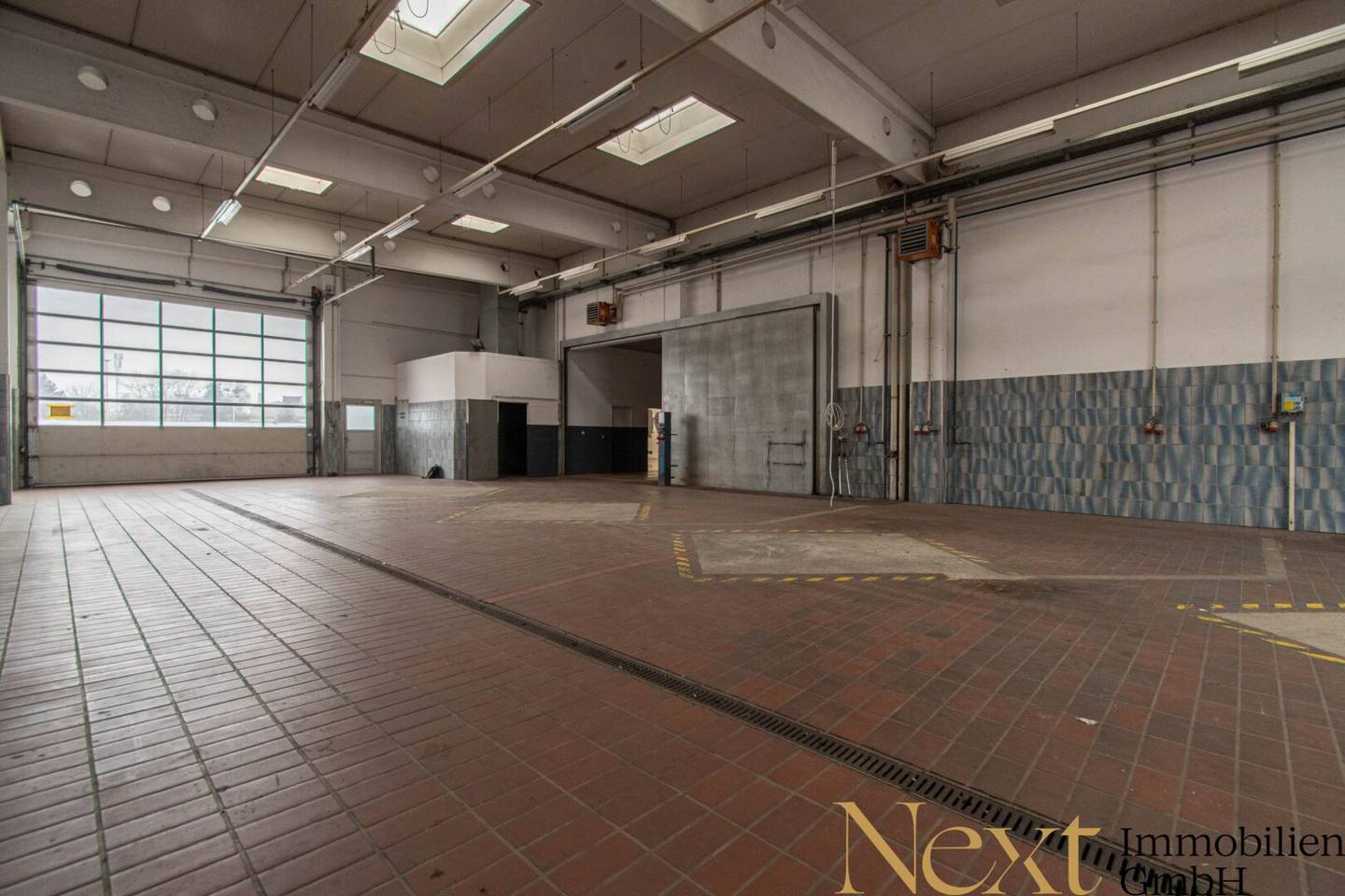 Commercial property with storage halls roller doors and rooftop terrace