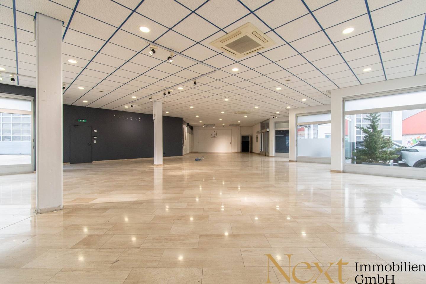 Commercial property with storage halls roller doors and rooftop terrace
