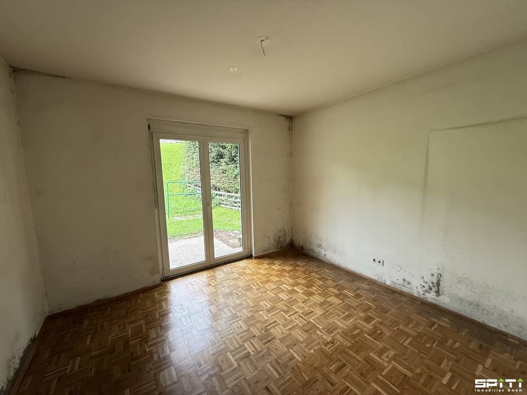 Erdgeschosswohnung mit Terrasse und Kellerabteil