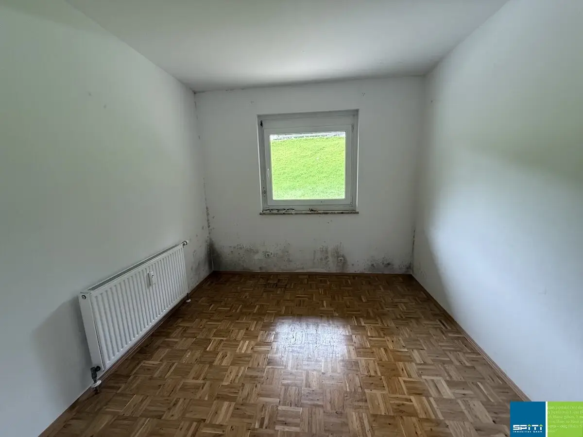 Erdgeschosswohnung mit Terrasse und Kellerabteil
