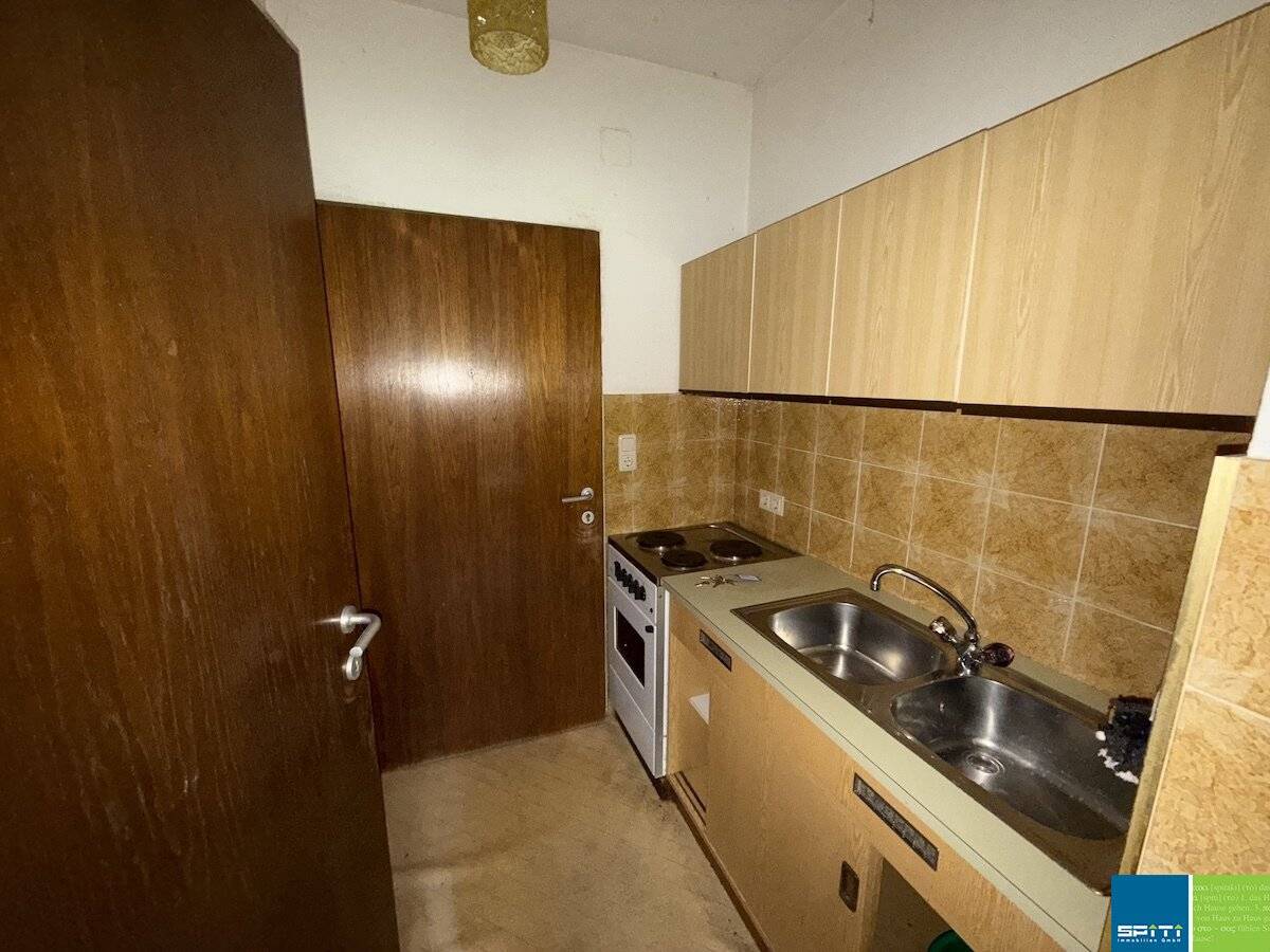 Erdgeschosswohnung mit Terrasse und Parkplatz
