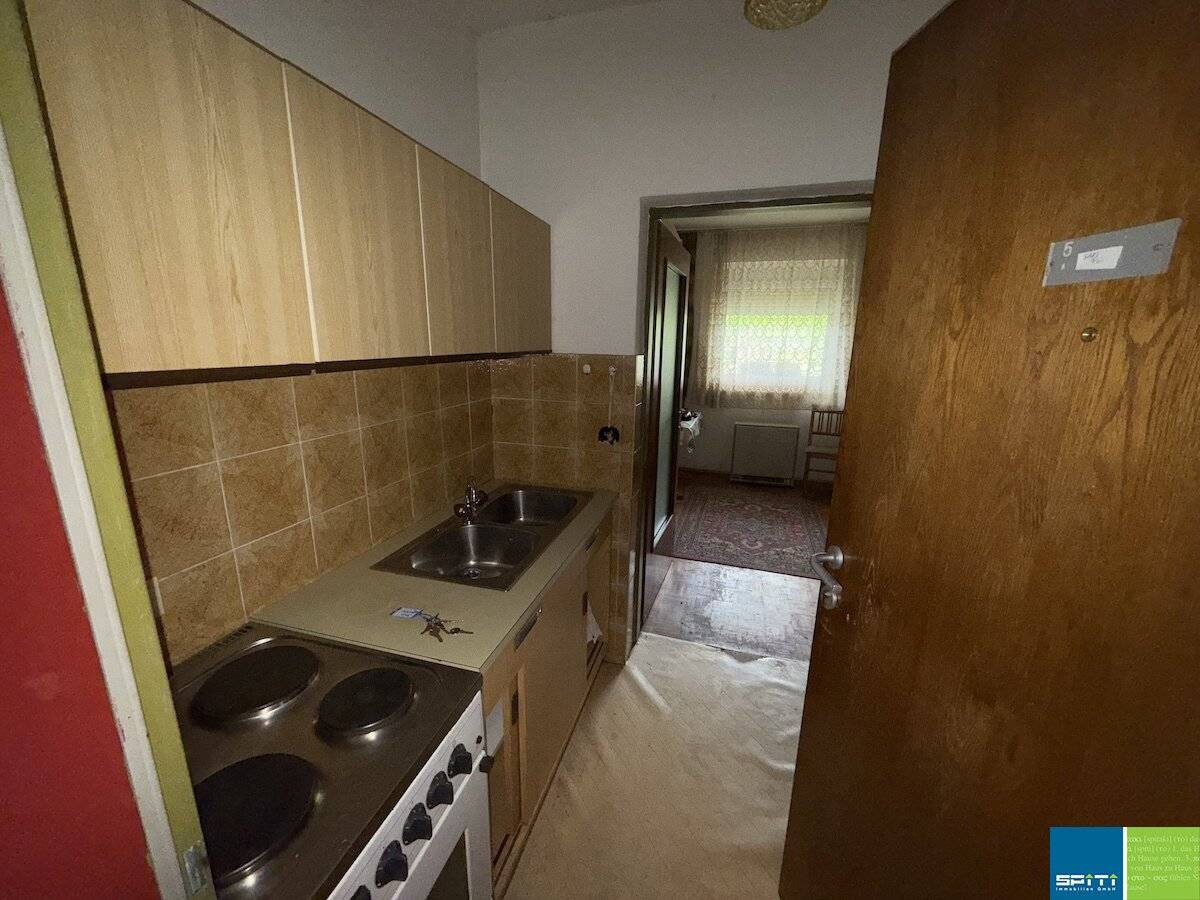 Erdgeschosswohnung mit Terrasse und Parkplatz