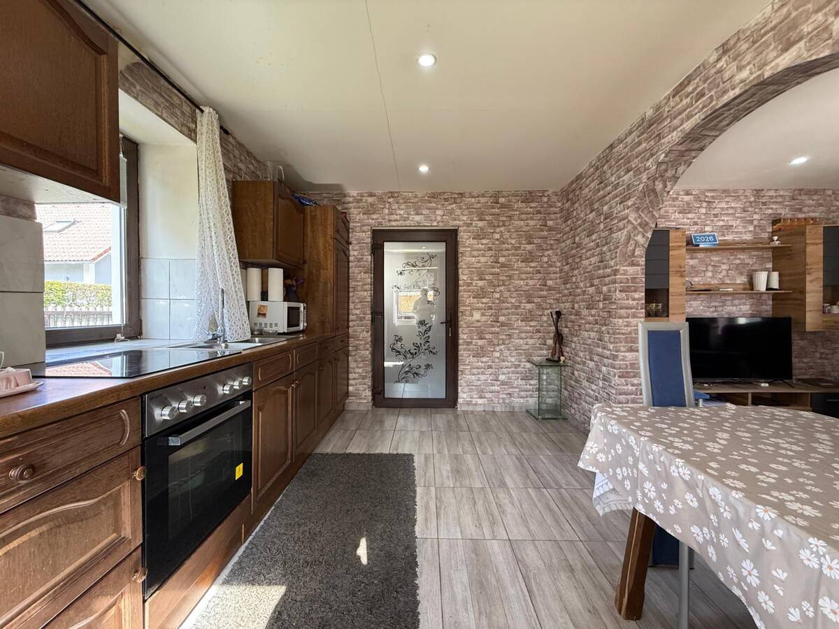 Single family home with sunny terrace and garden