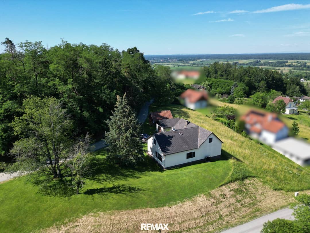 Family House with Garage and Panoramic View in Sunny Quiet Location