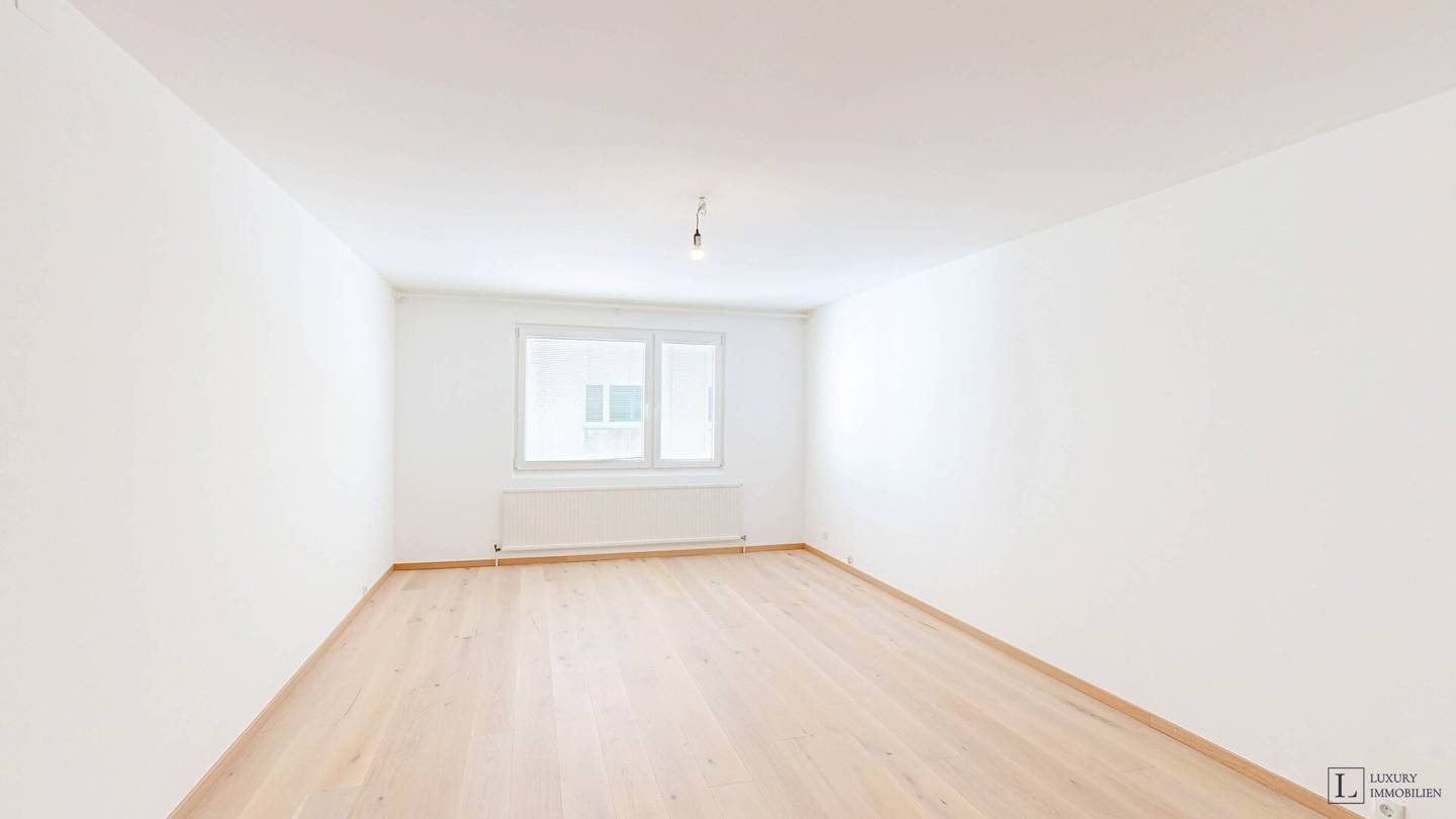 Renovated apartment with parquet and fitted kitchen in central location