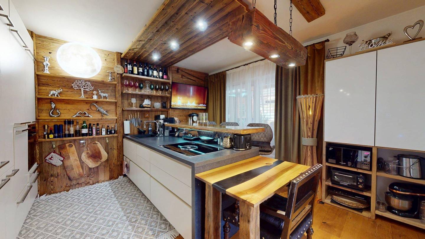 Erdgeschosswohnung mit großen Terrassen und Garten
