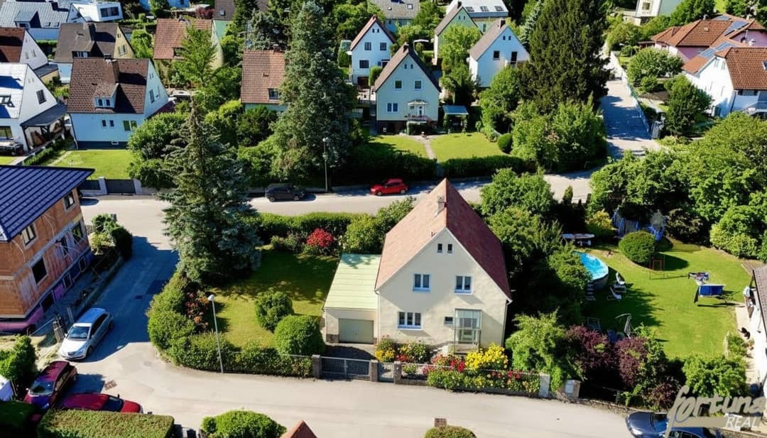 Einfamilienhaus mit Garten Terrasse und Garage in sonniger Südlage