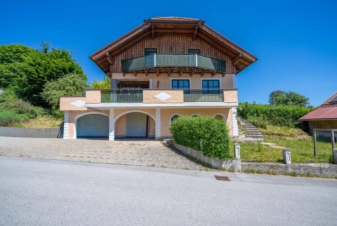 Einfamilienhaus mit Garten und Doppelgarage in ruhiger Lage