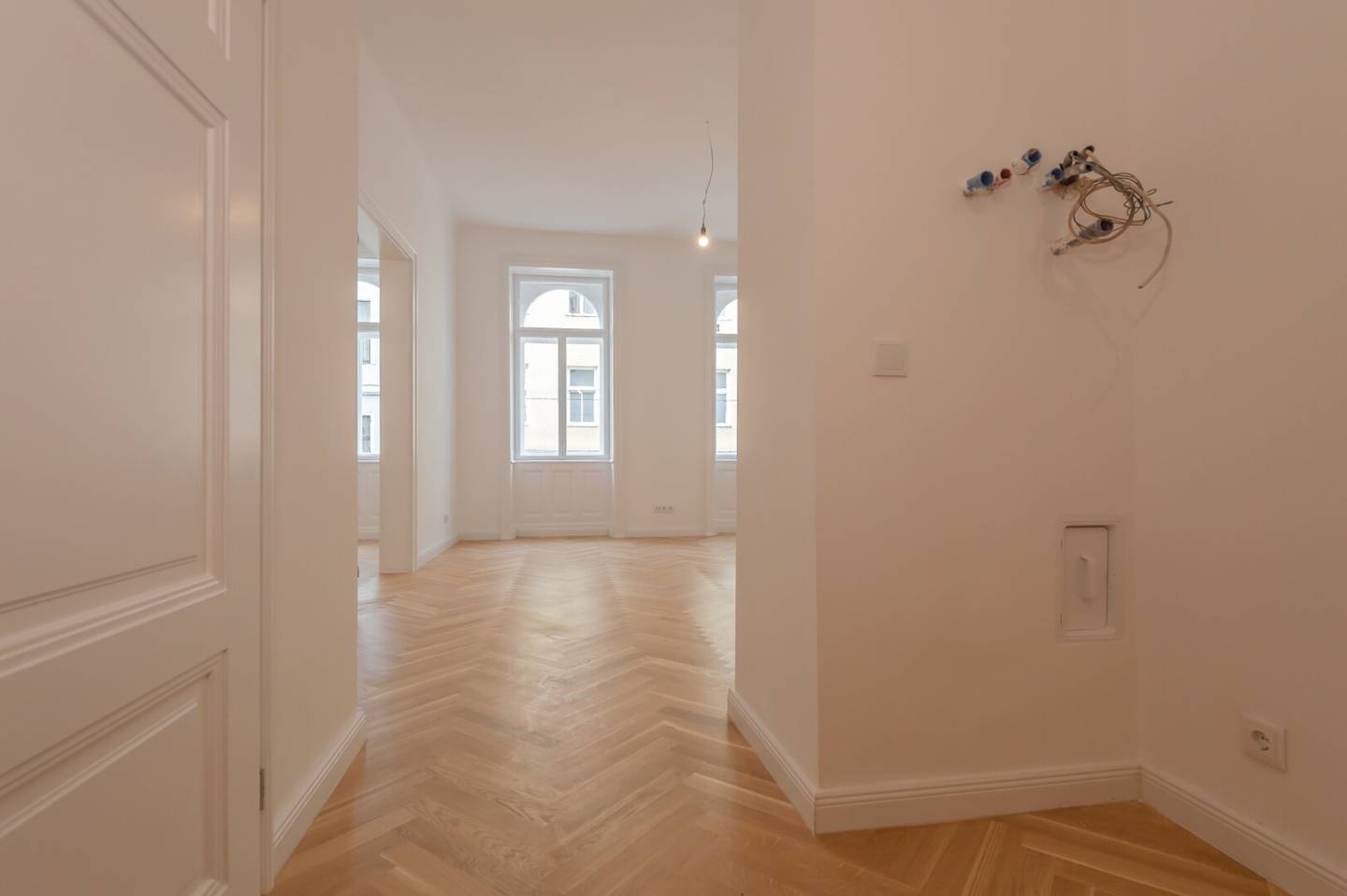 Generously renovated Altbau apartment with courtyard facing balcony at Einsiedlerplatz