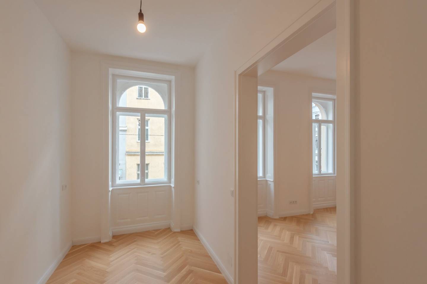 Generously renovated Altbau apartment with courtyard facing balcony at Einsiedlerplatz