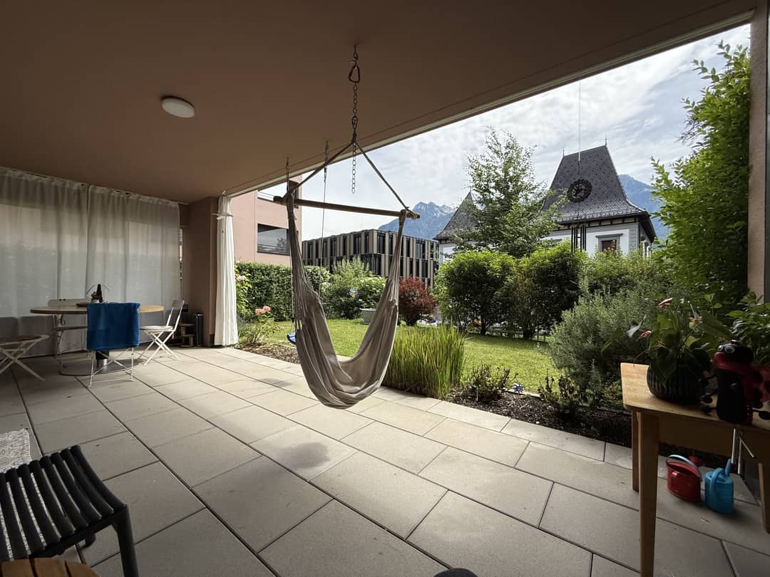 Bright ground floor apartment with terrace and garden