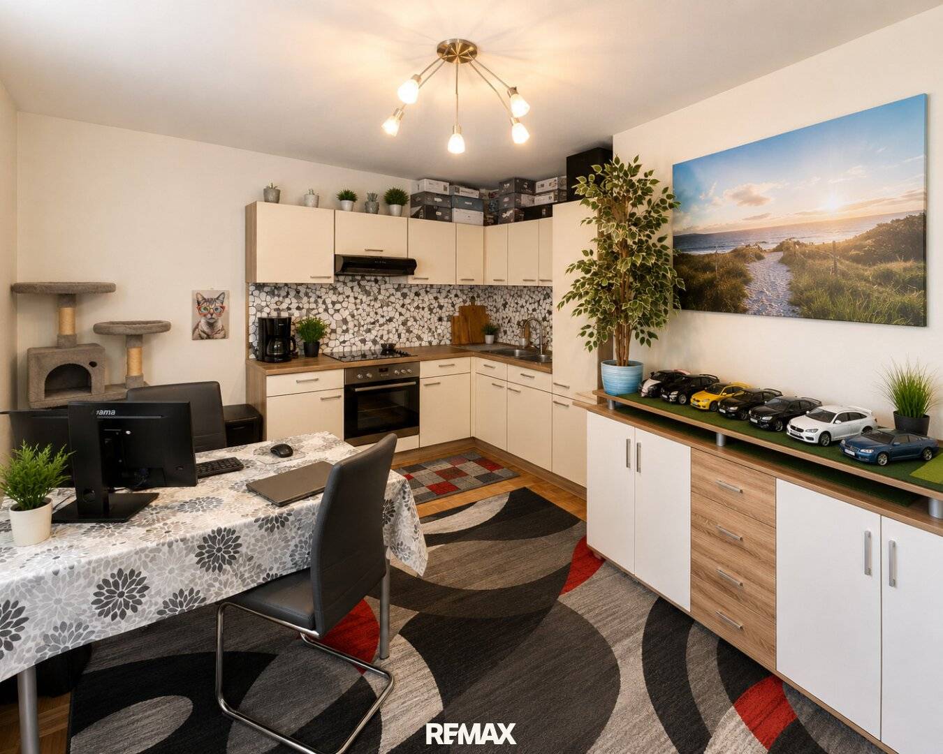 Partially furnished attic apartment with fitted kitchen in central location