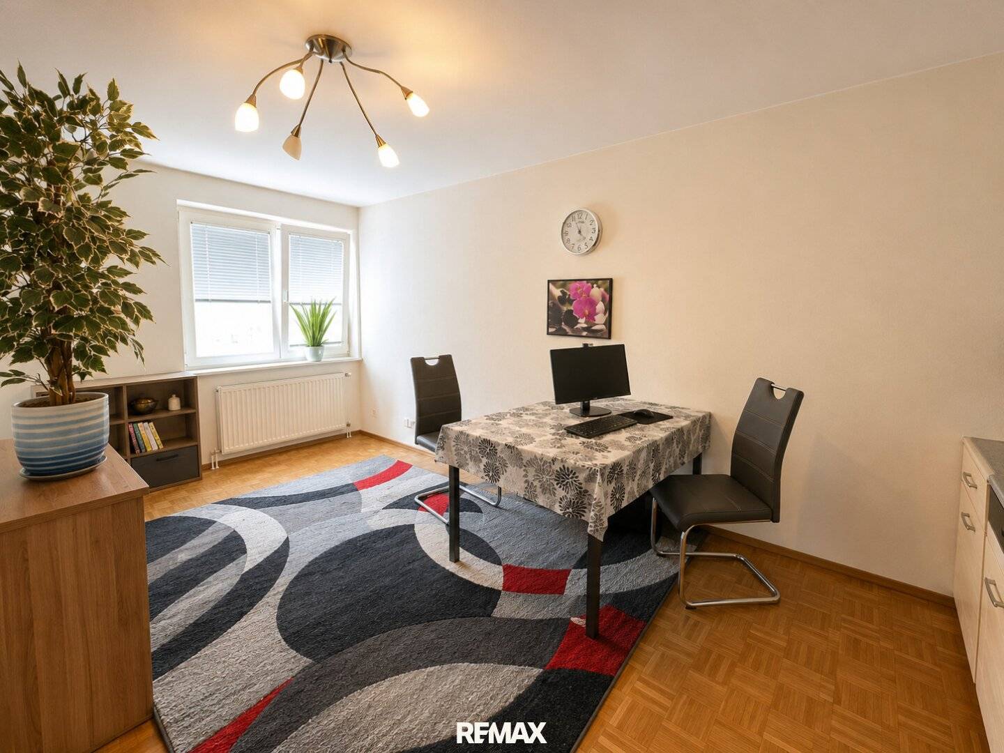 Partially furnished attic apartment with fitted kitchen in central location