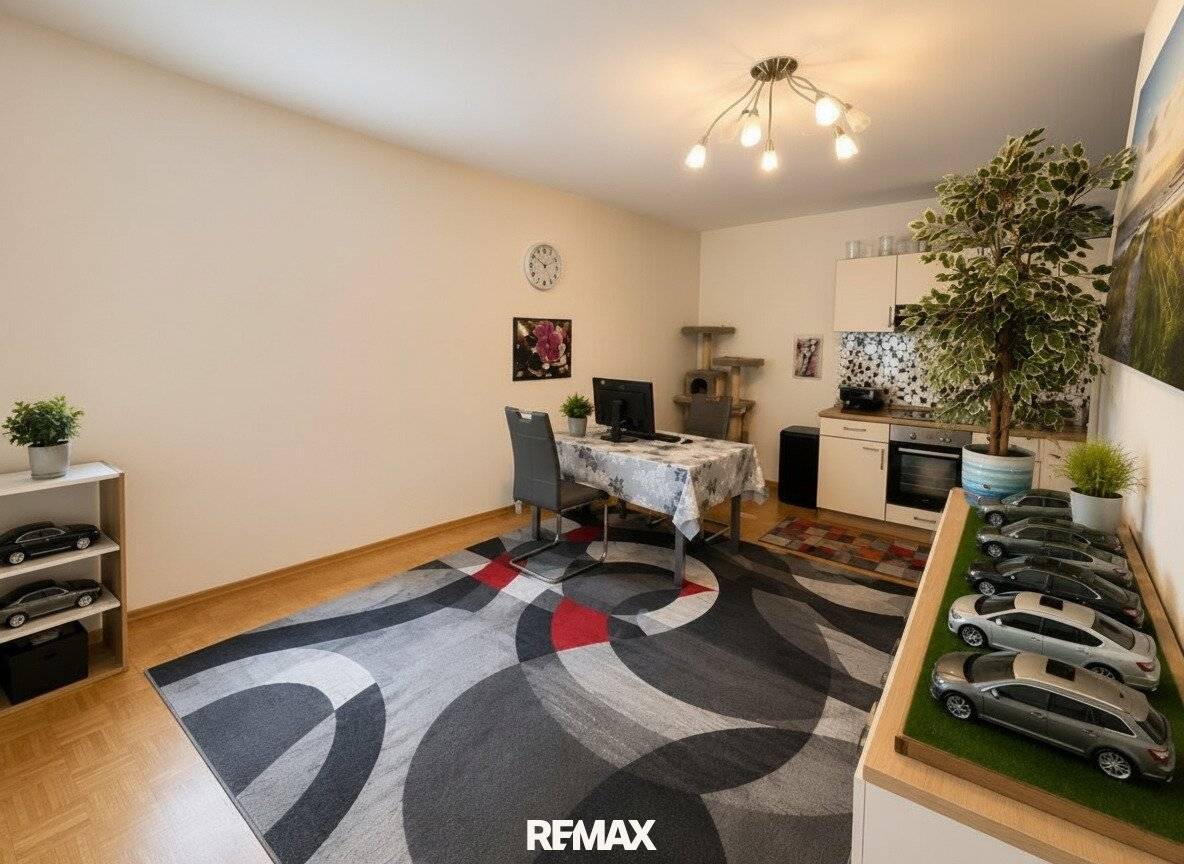 Partially furnished attic apartment with fitted kitchen in central location