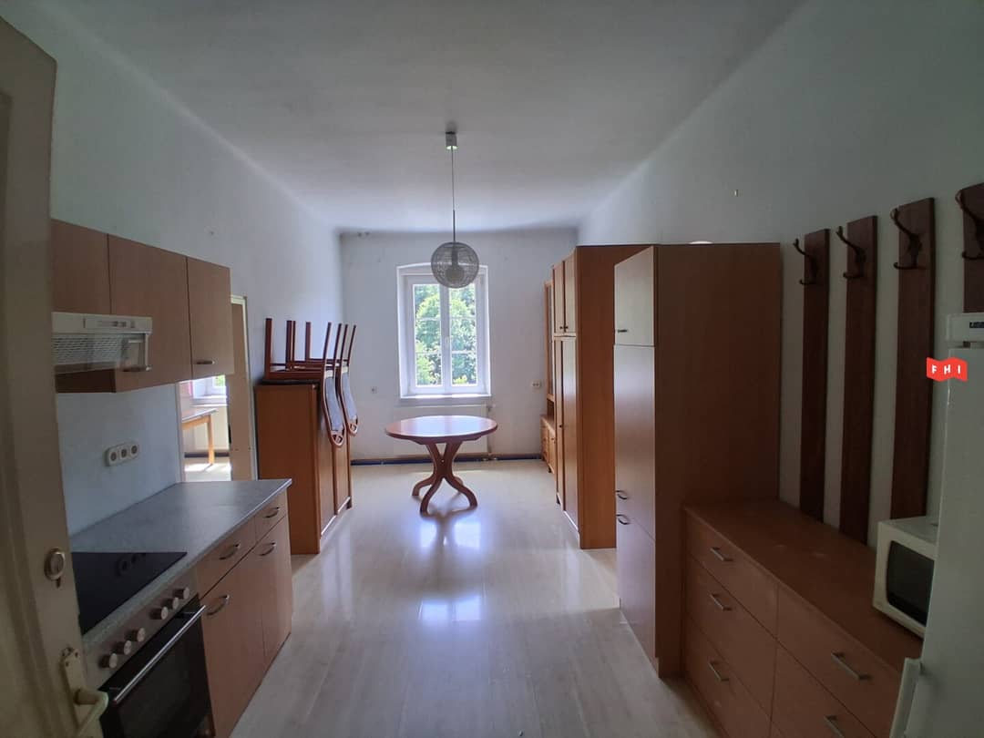Bright apartment with open kitchen and shared garden
