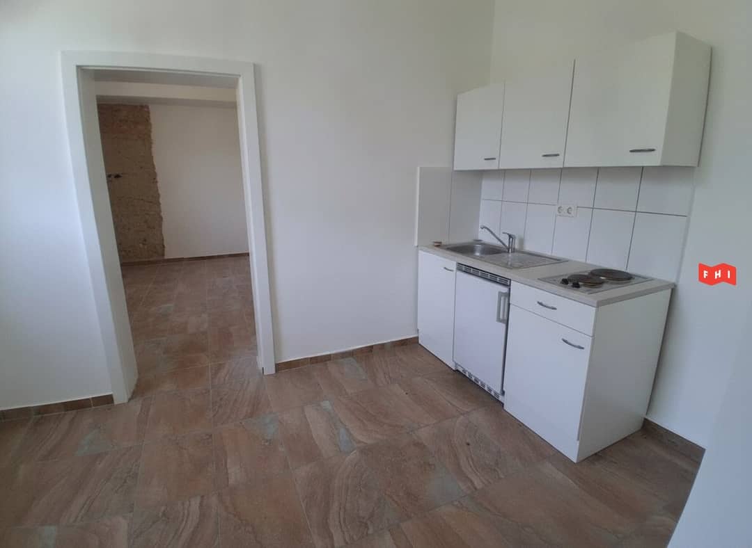 Ground floor apartment with shared garden and cellar
