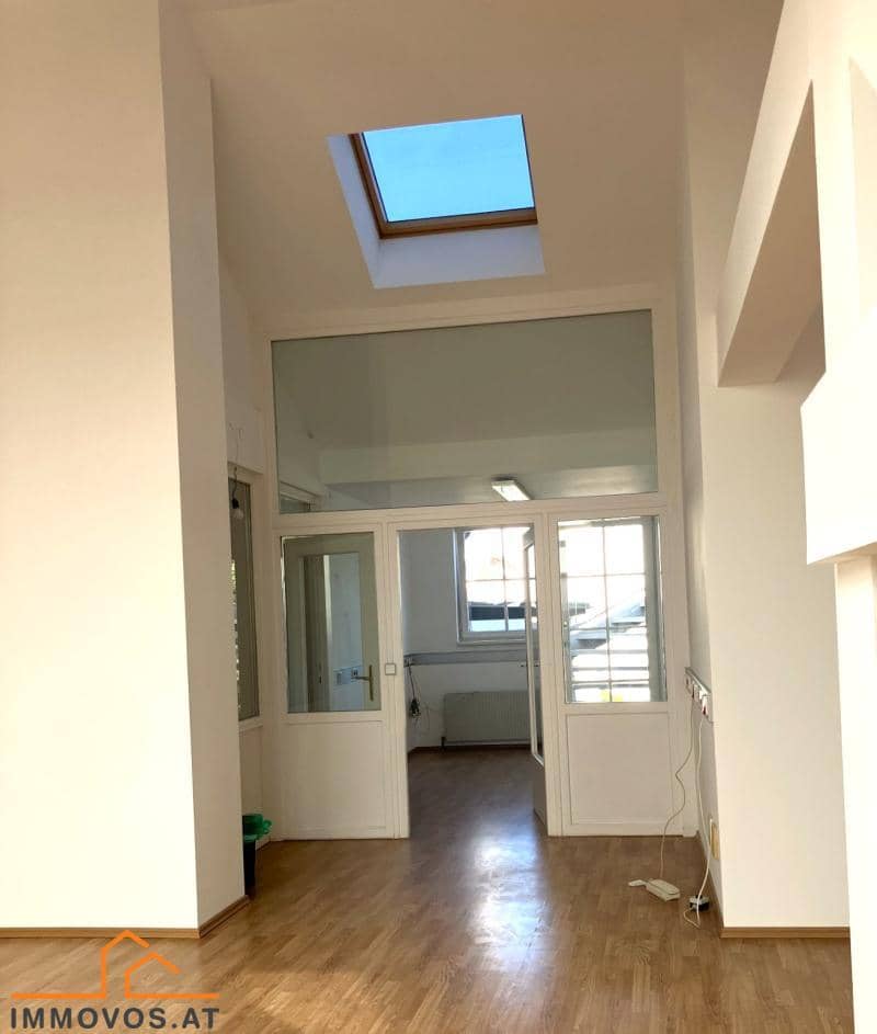 Bright attic office with courtyard facing rooftop terrace