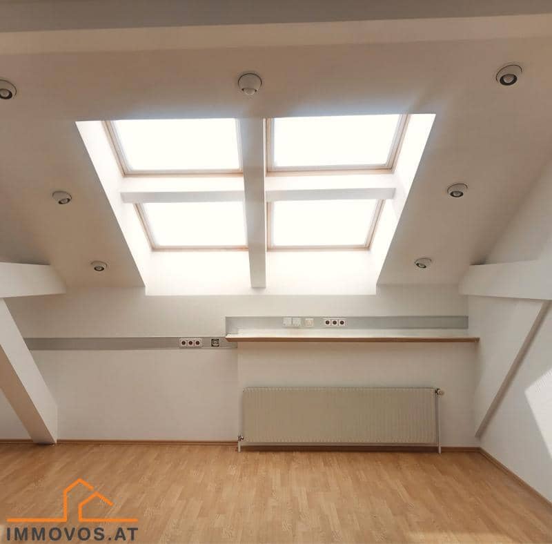 Bright attic office with courtyard facing rooftop terrace