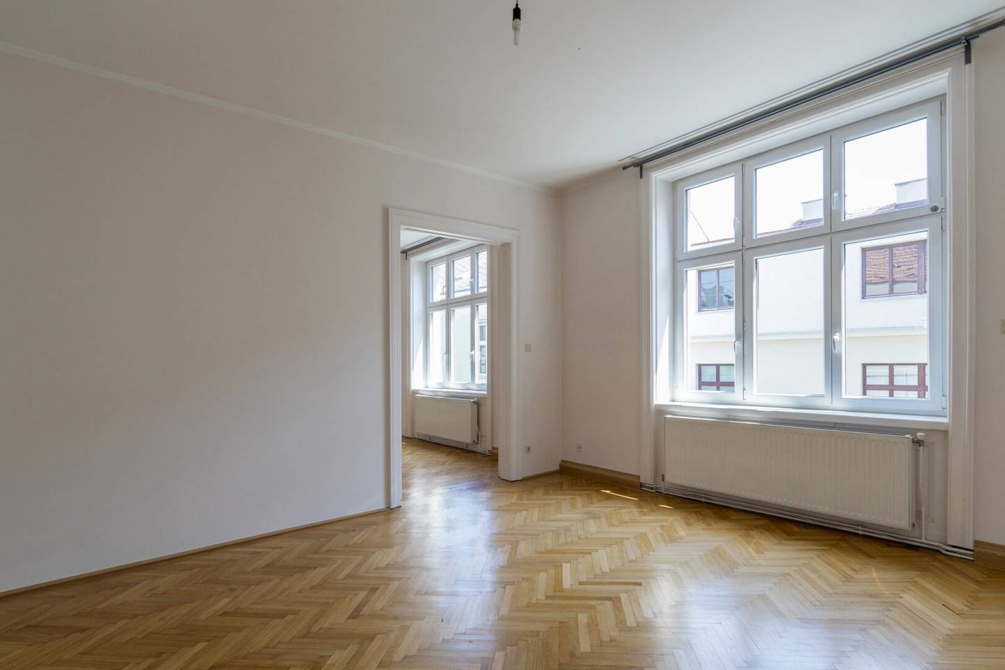 Courtyard-facing period apartment with parquet and high ceilings