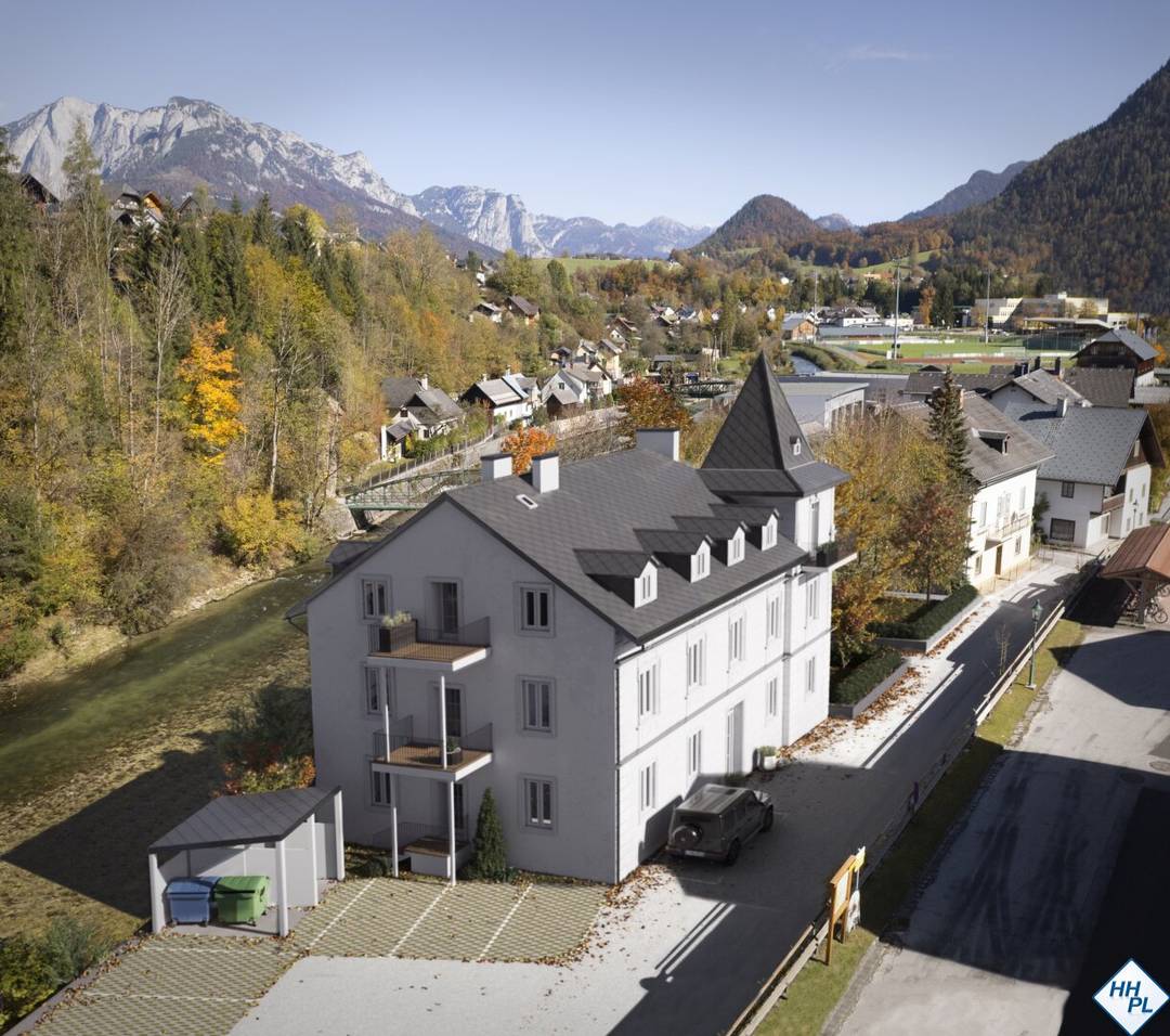 Top floor apartment with balcony by the Traun river