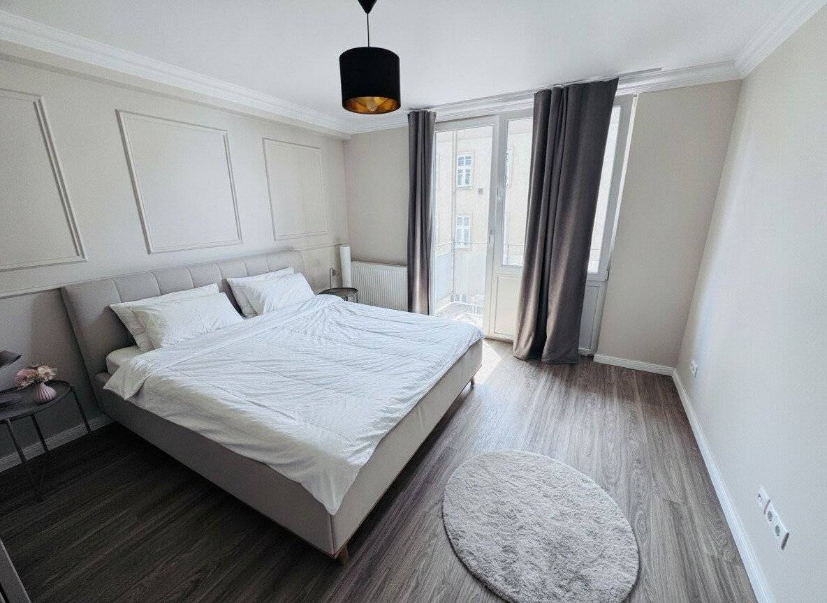 Erdgeschosswohnung mit Balkon in zentraler Lage