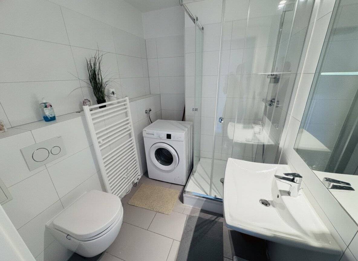 Erdgeschosswohnung mit Balkon in zentraler Lage