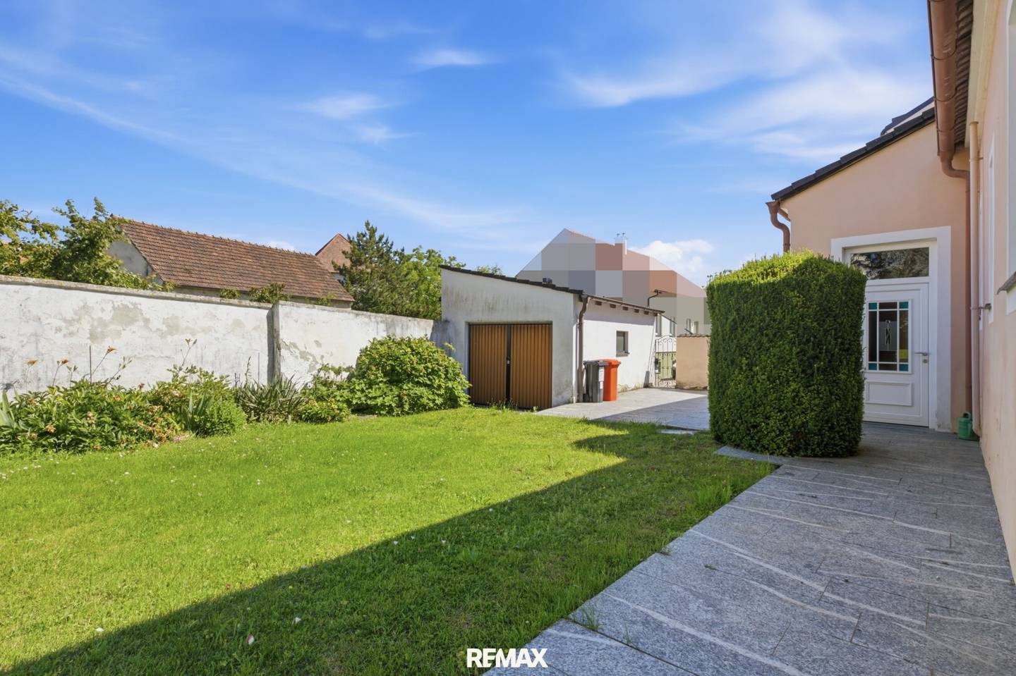 Charming turn of the century townhouse with garage and veranda