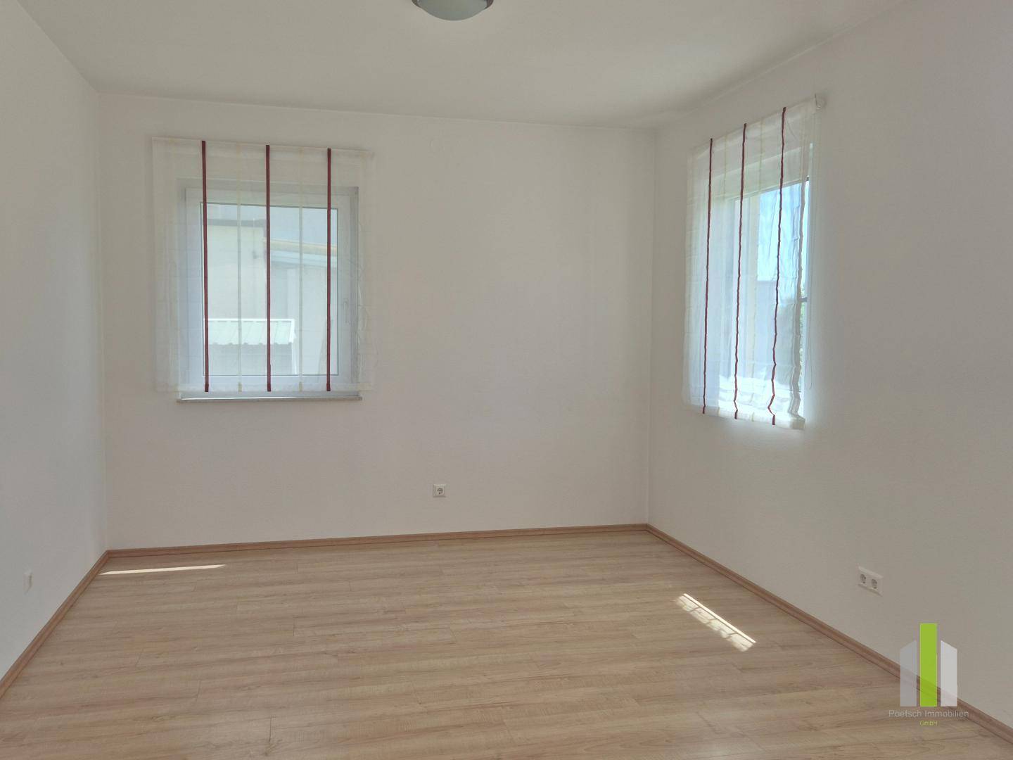 Sunny Family House with Balcony and Distant View