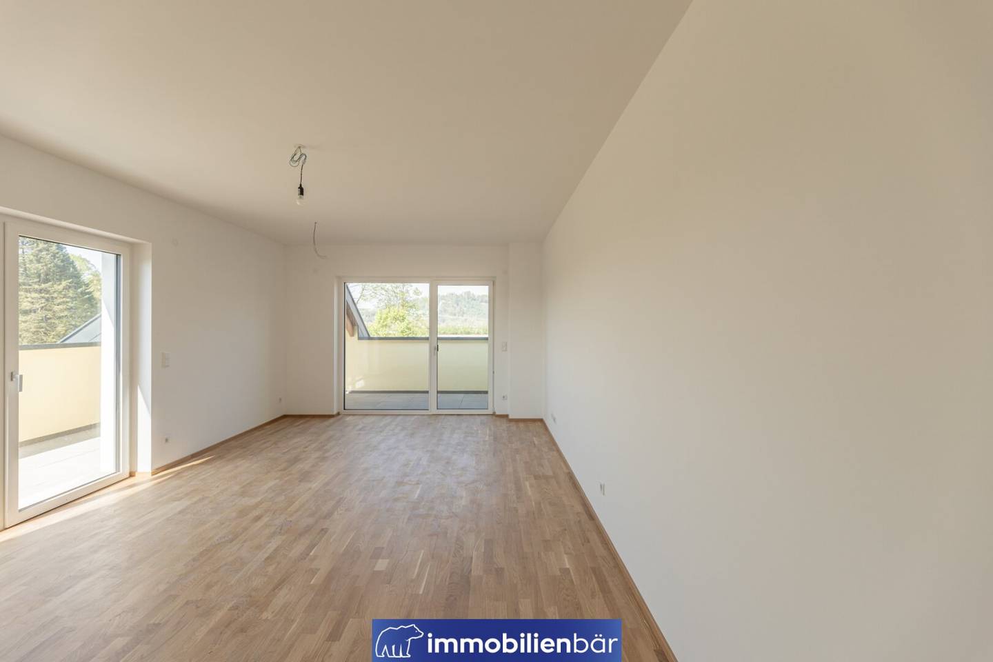 Neubauwohnung mit Dachterrasse und Parkplatz