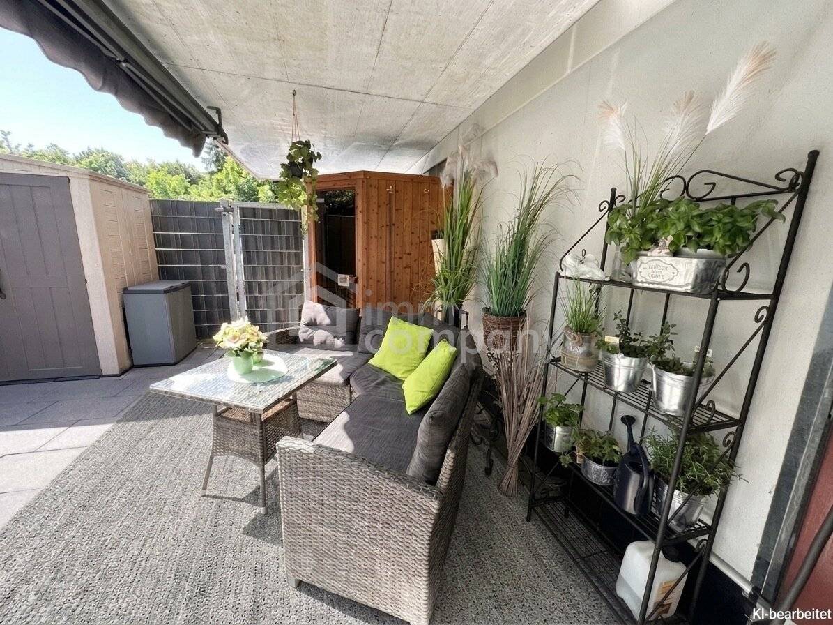 Erdgeschosswohnung mit beheiztem Wintergarten und Garten