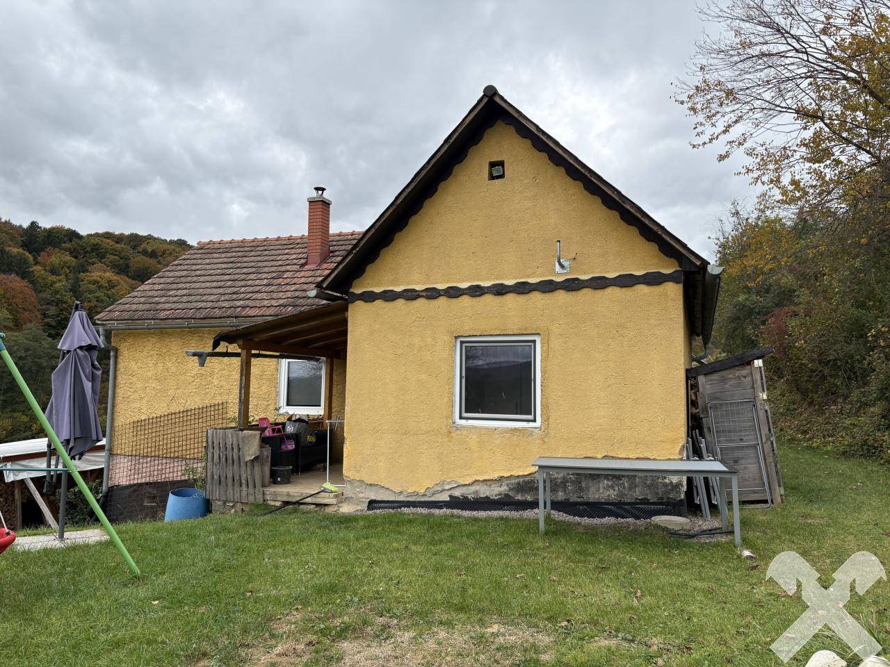Einfamilienhaus mit Garten und Ausbaupotenzial