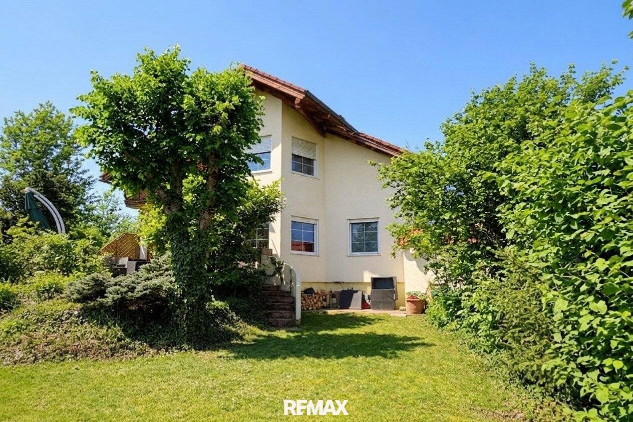 Single-family home with terrace and view of the Anninger