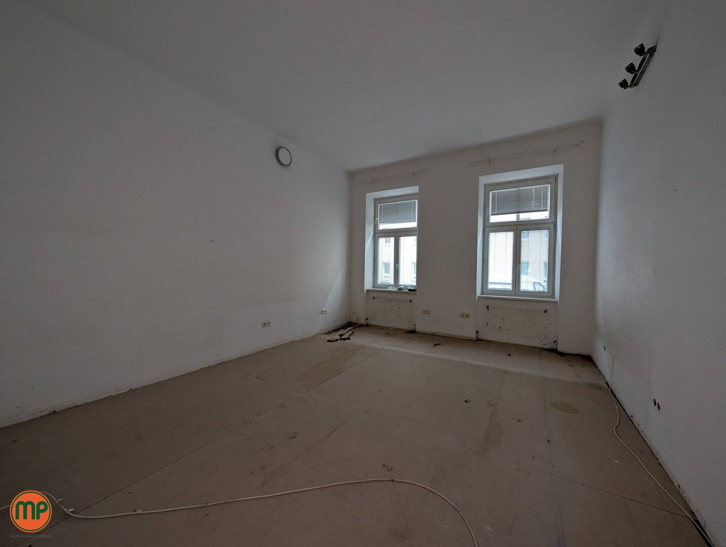 Mezzanine apartment in historic building with design potential