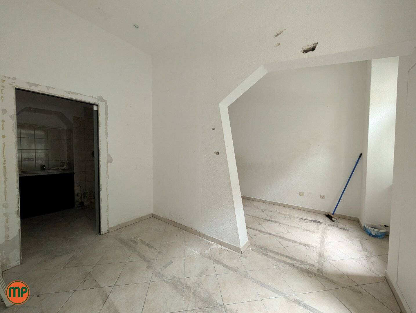 Mezzanine apartment in historic building with design potential
