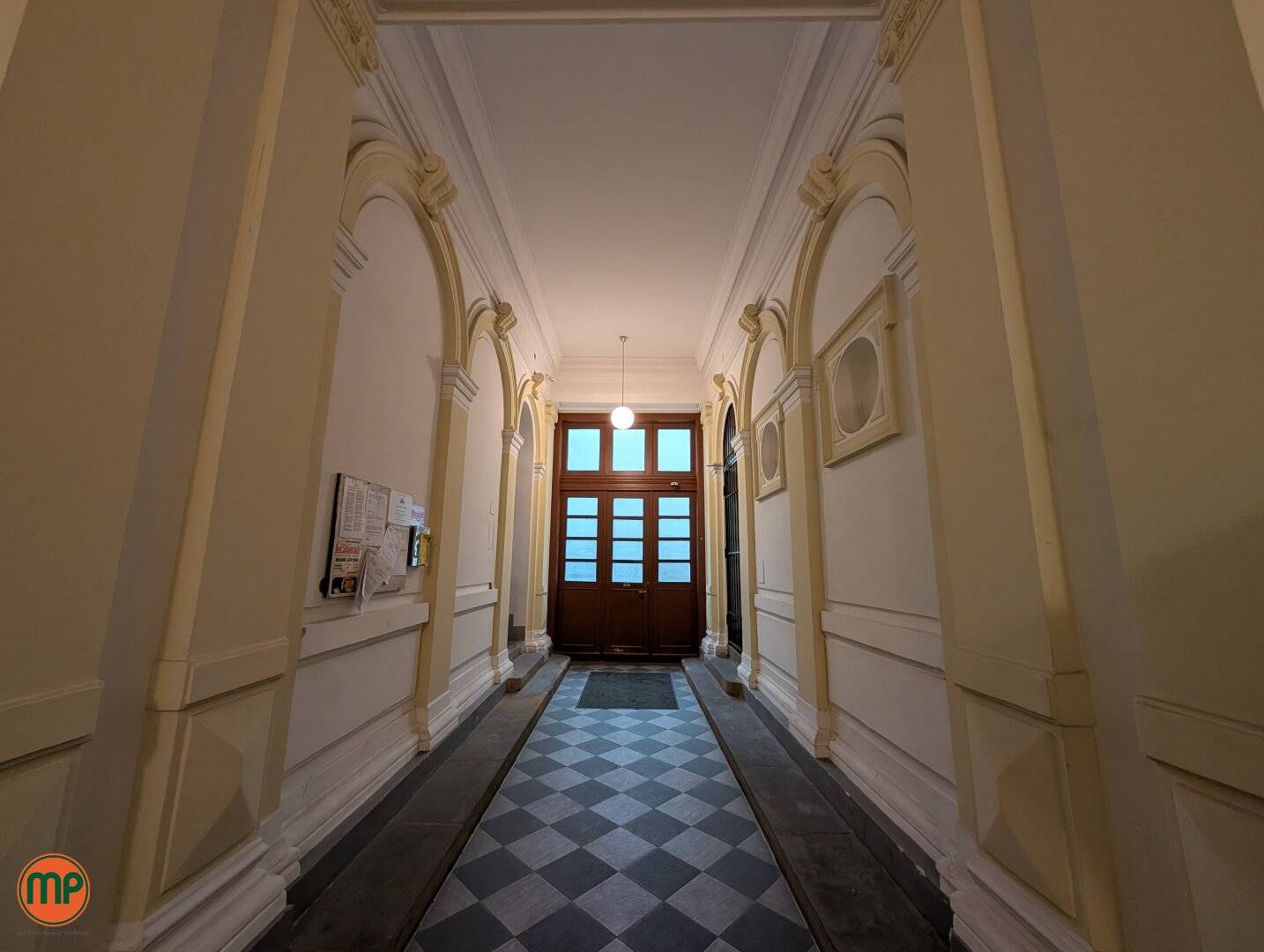 Mezzanine apartment in historic building with design potential