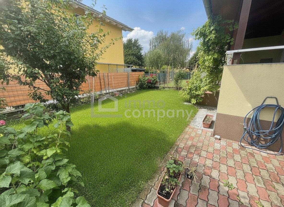 Well-maintained semi-detached house with garden and carport
