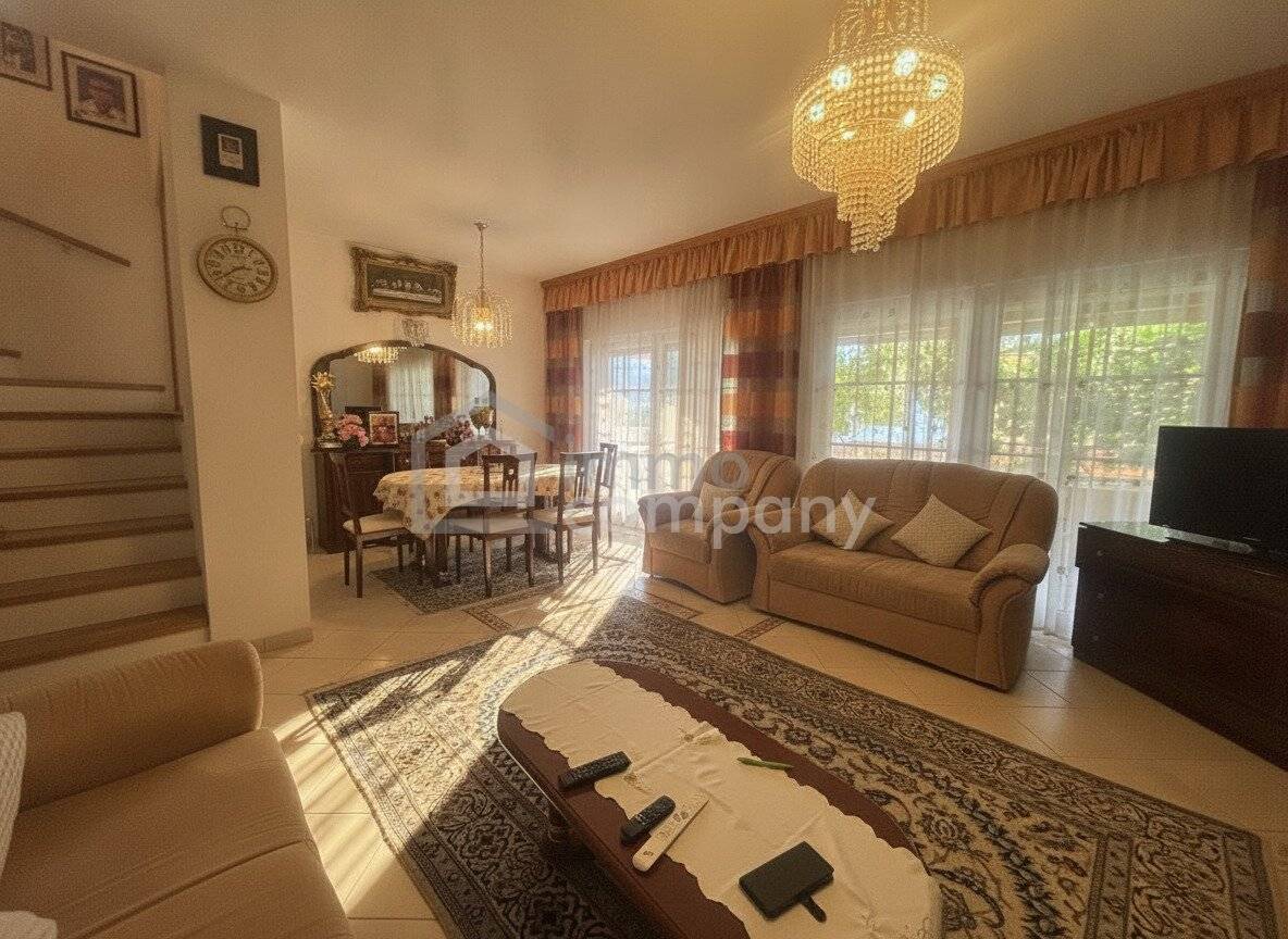 Well-maintained semi-detached house with garden and carport