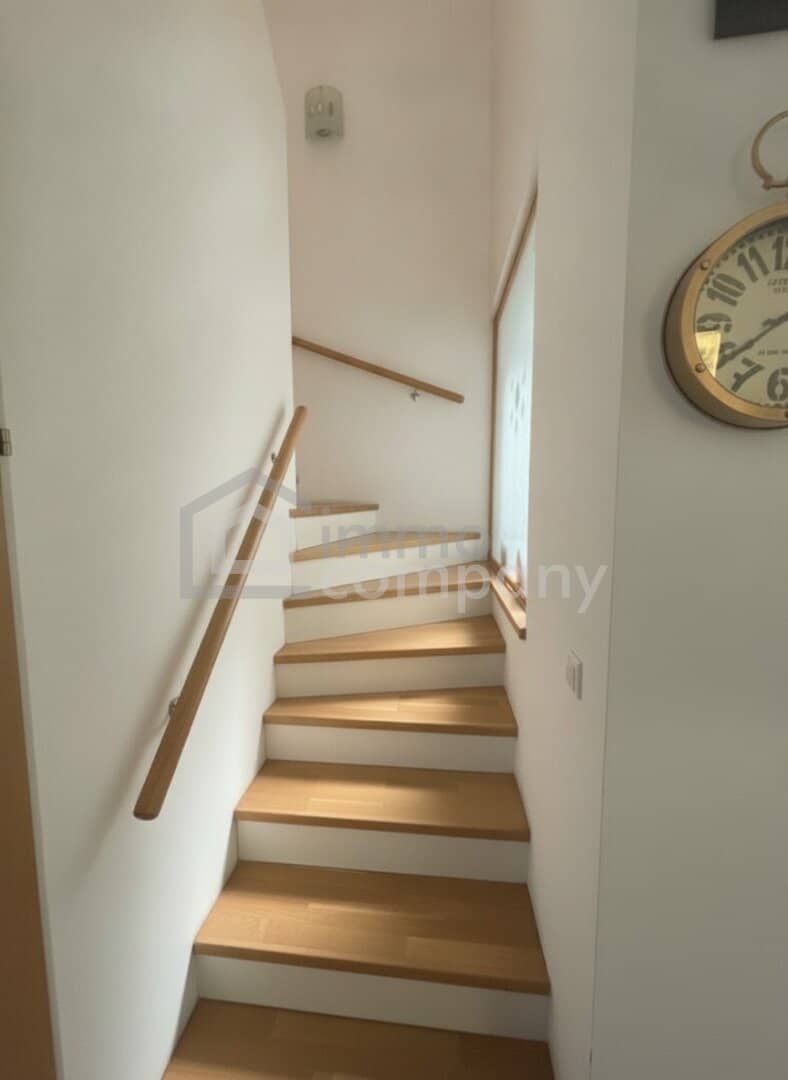 Well-maintained semi-detached house with garden and carport