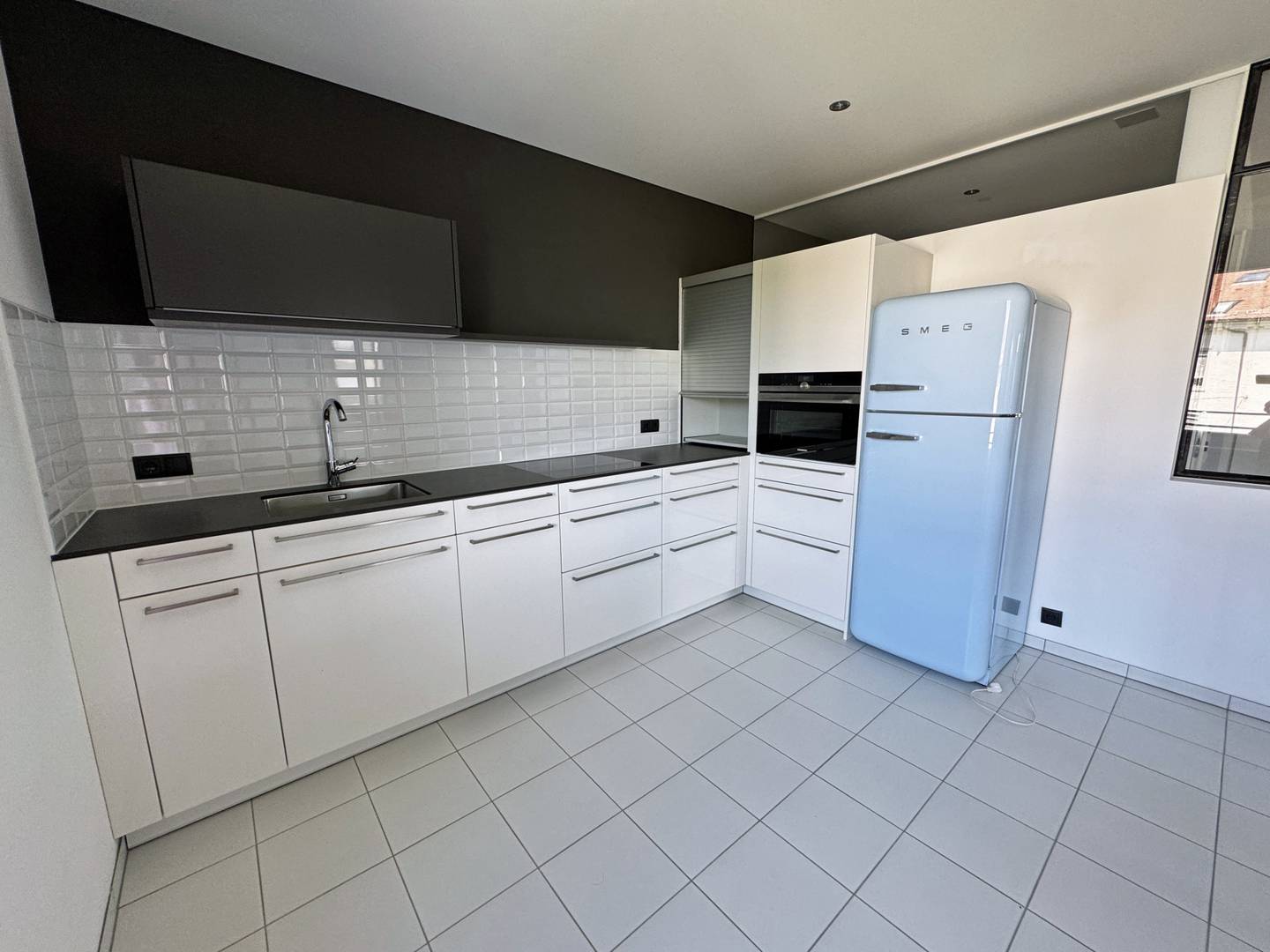 Dachgeschosswohnung mit Terrasse und Einbauküche in zentraler Lage