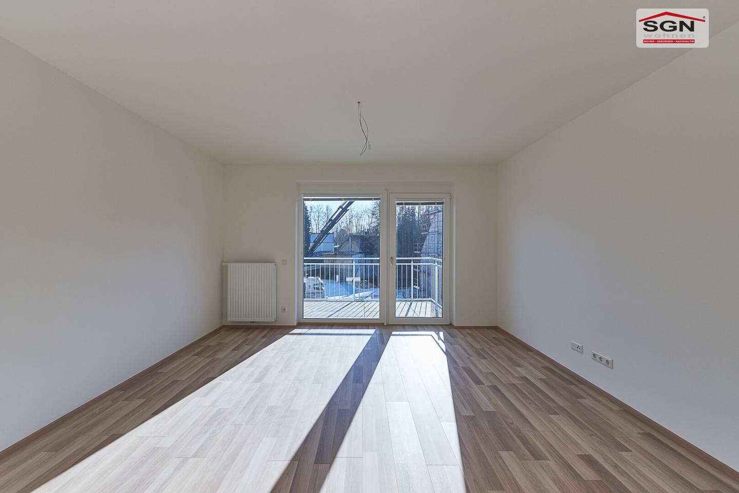 New build apartment with balcony and parking in central location