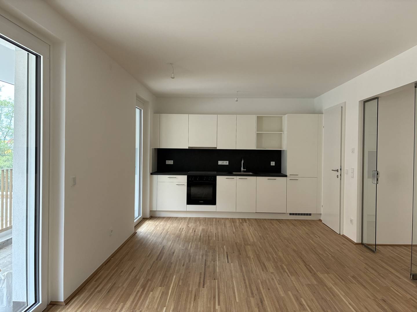 Ground floor apartment with garden and balcony in sustainable new build