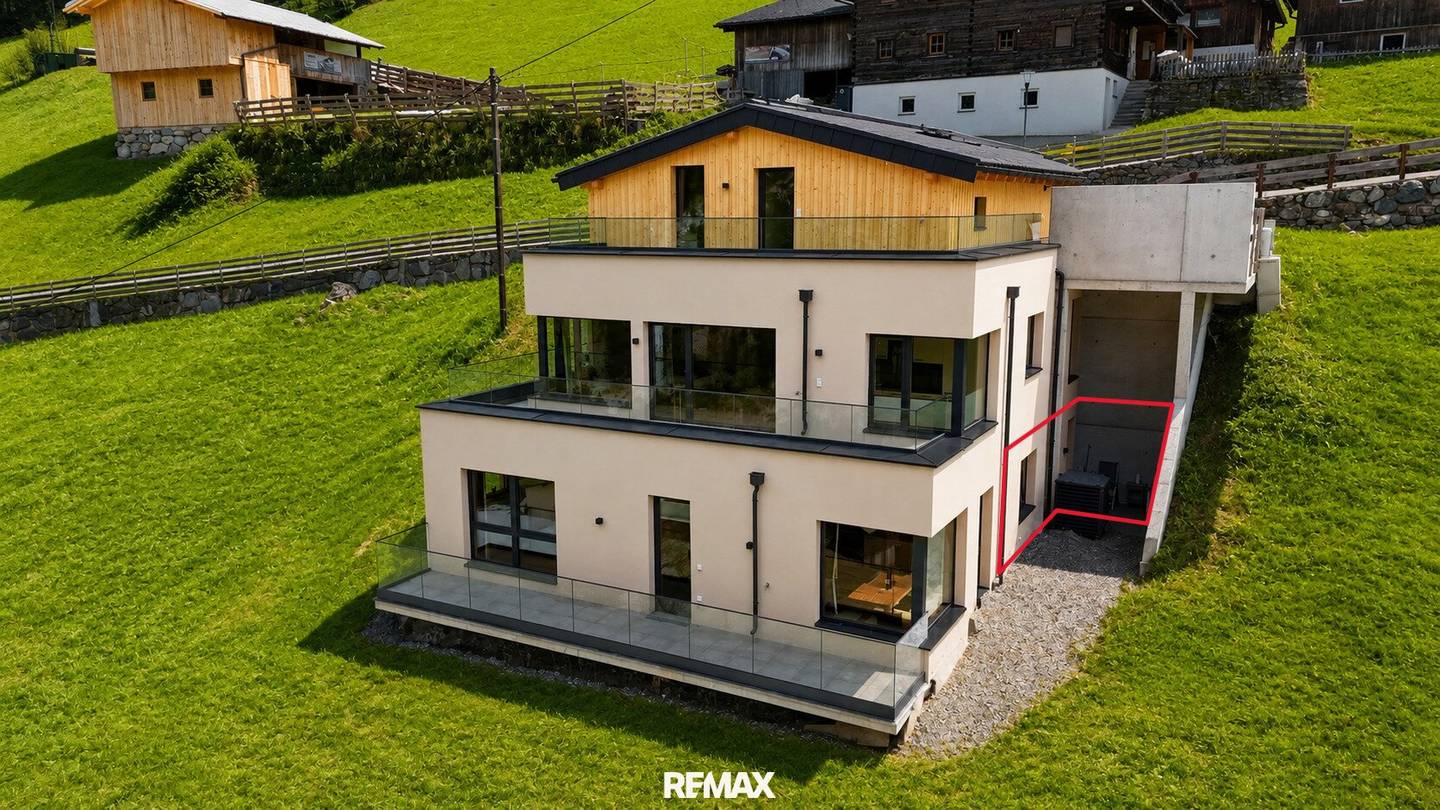 Neubauwohnung mit Parkplatz und Blick in die Skiregion