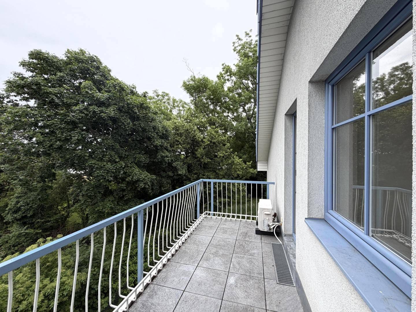 Bright Attic Apartment with Balcony and Green Views