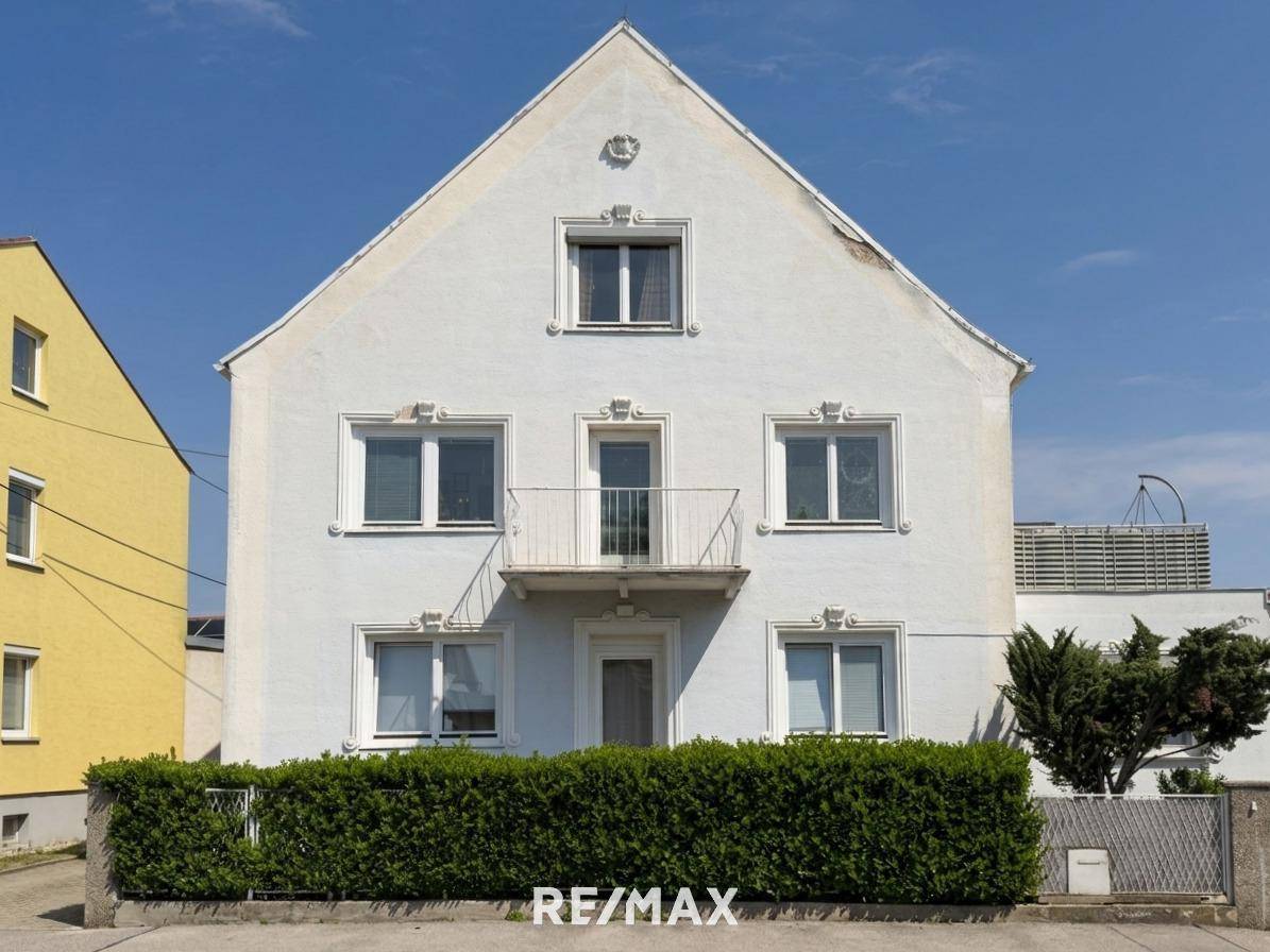 Multi-family house with four units and garden access near Vienna