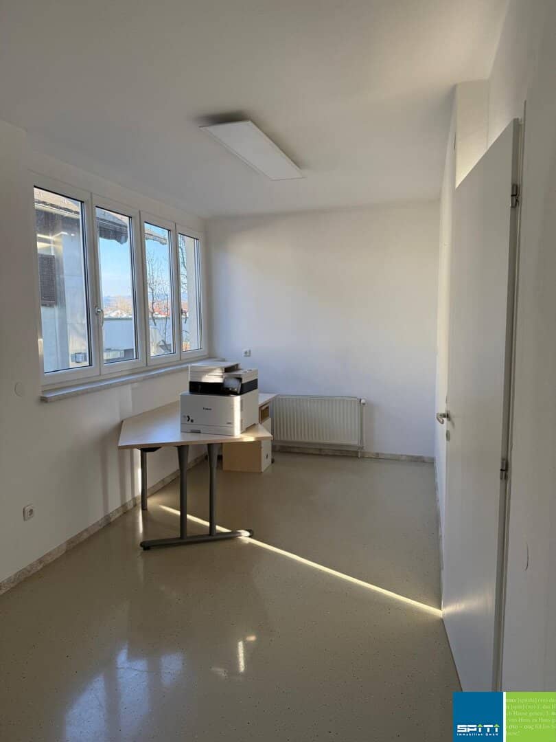 Helle Maisonettewohnung mit Garten und Balkon