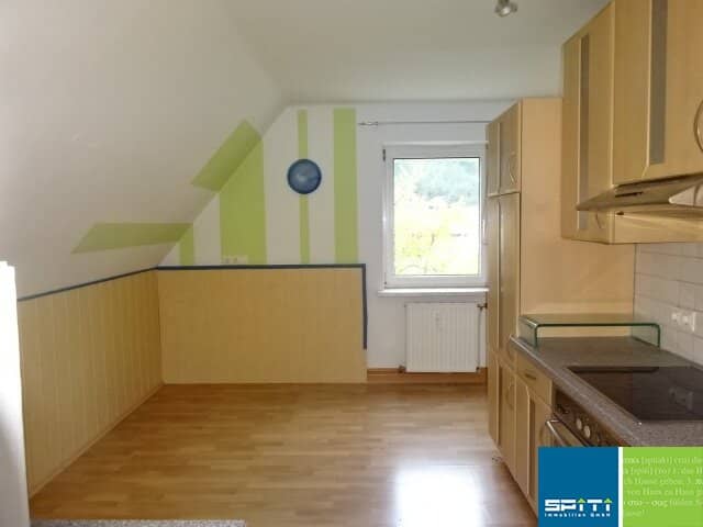 Dachgeschosswohnung mit Gartenanteil und Kellerabteil