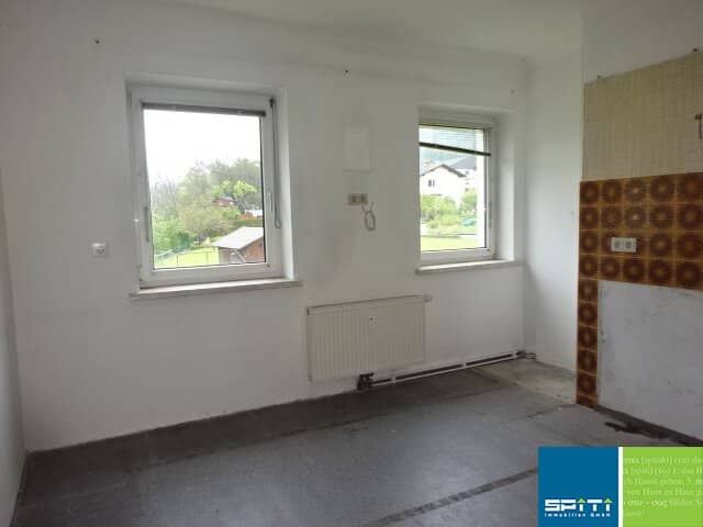 Erdgeschosswohnung mit Gartenanteil und Keller
